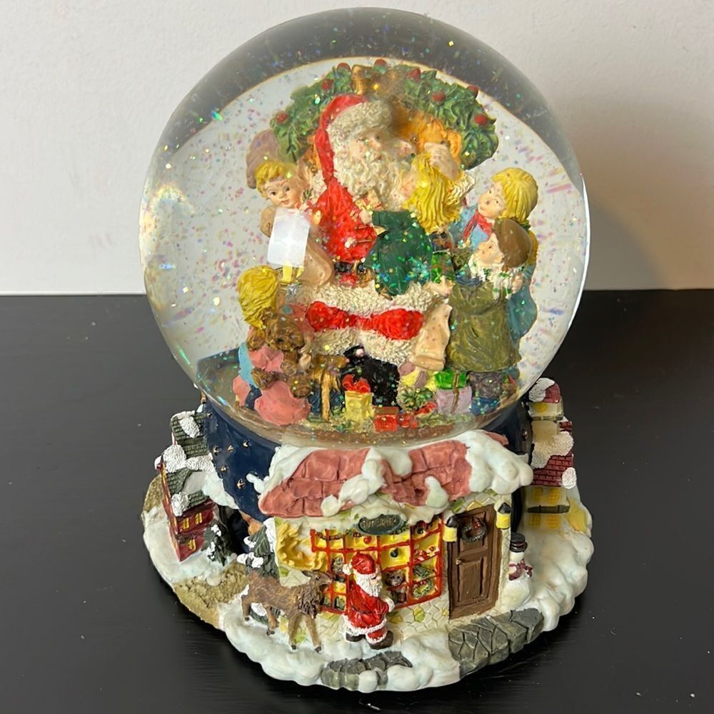 World bazaars Christmas  Santa and children snow globe